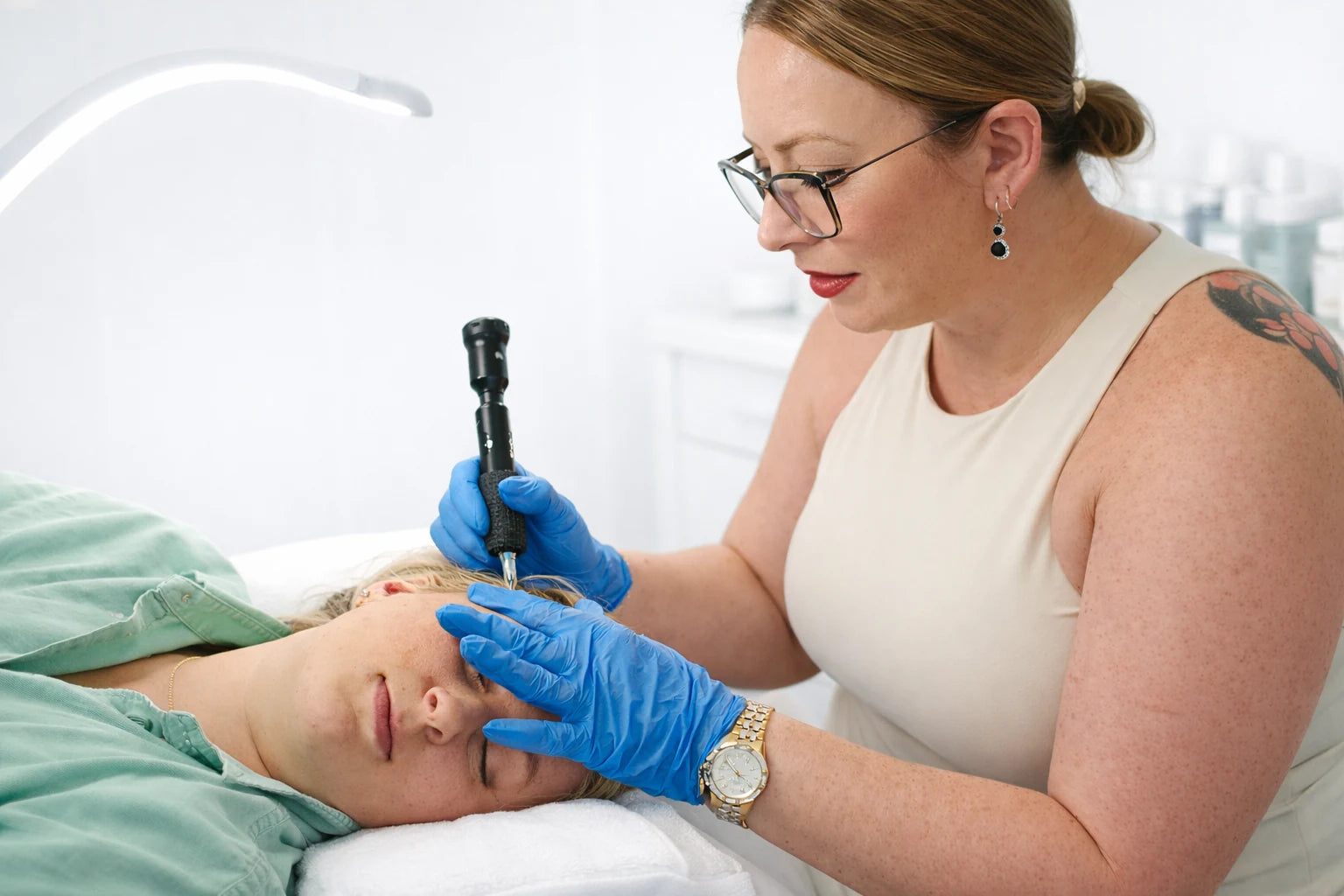 Shae performing a hair-restoration treatment at Body by Shae
